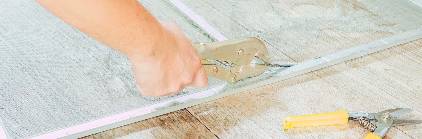 man-is-working-with-mosquito-wire-screen-installation_1150-6206